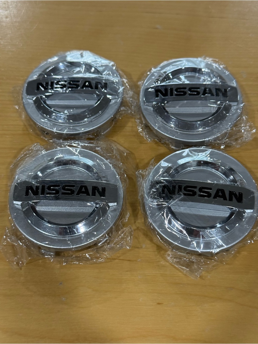 4pcs 58mm / 2.28” Nissan Logo Wheel Center Caps. Brand New.